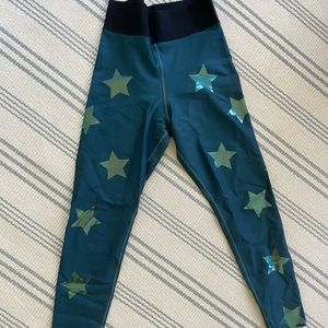 Ultracor x Barry’s aqua blue metallic star leggings